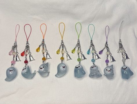 Ghost phone or bag charm available now in my shop! ($11.99) So cute for the Halloween season, but aesthetically pleasing for ur favorite color! Comes in 8 different colors! Link in bio! Ships out same or next day ! - - - #ghost #halloween #ghostnecklace #spirit #etsy #homemade #y2k #y2kaccessories #accessories #phonecharm #charm #phone #halloweencharm #halloweendecor #cutehalloween #cute #rainbow #pride #color #beaded #smallbuisness #buisness #crafts #glassbead #cuteghost #kawaii Spirit Phone, Rainbow Ghost, Ghost Keychain, Rainbow Kawaii, Halloween Keychain, Rainbow Halloween, Charm Accessories, Kawaii Rainbow, Y2k Accessories