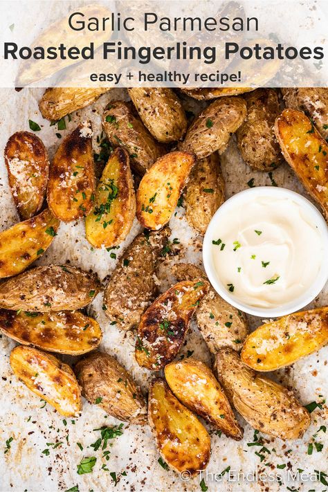 These easy roasted fingerling potatoes will turn any weeknight meal into an elegant affair. They're seasoned with olive oil and garlic powder, cooked to a golden crisp, then topped with parmesan cheese. They're simple to make, and ready in just 50 minutes! #theendlessmeal #roastedpotatoes #potato #potatoes #sidedish #fingerlingpotatoes #potatorecipe Fingerling Potato Recipe, Fingerling Potatoes Recipes, Easy Roasted Potatoes, Baked Pork Tenderloin, Roasted Fingerling Potatoes, Potato Croquettes, Roasted Potato Recipes, Potato Recipes Side Dishes, Fingerling Potatoes