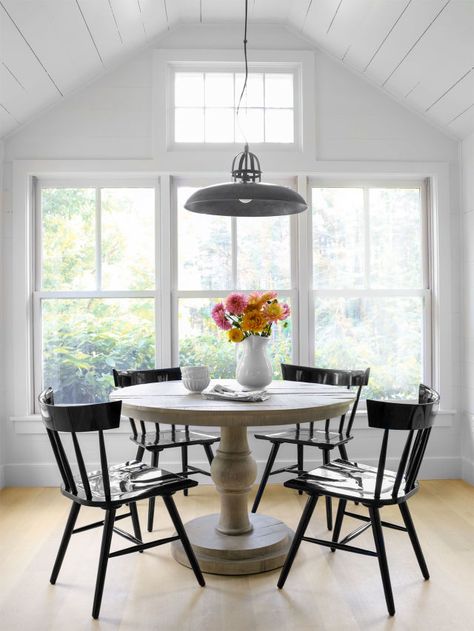 The family of four enjoys meals—as well as great views—at an antique table with Windsor-style chairs in their breakfast nook. Nook Furniture, Farmhouse Breakfast, Nook Dining, Breakfast Nook Dining Set, Diy Home Interior, Nook Dining Set, Nook Table, Friends Time, Primitive Kitchen