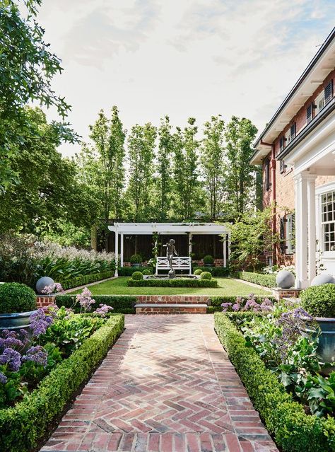 Manicured gardens with brick pathways surround this renovated 1930s Georgian home. Photography: Lisa Cohen Land Scaping, Backyard Plans, Pathway Garden, Brick Ideas, Hamptons Style Home, Brick Pathway, Front Garden Design, Garden Paving, Front Yard Design