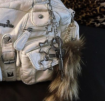 y2k purse star raccoon tail keychain Raccoon Tail Accessory, Tail Keychain Outfit, Raccoon Tail Keychain, Y2k Bag Charms, Raccoon Keychain, Raccoon Tail, Fox Tail Keychain, Tail Keychain, Y2k Bags