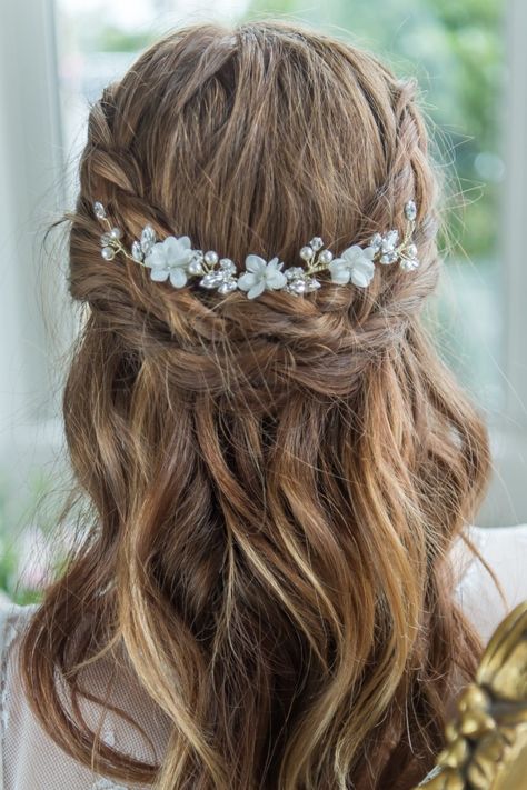 A delicate floral hair vine made up of ivory fabric flowers, shimmering pearls and glistening Swarovski crystals, hand wired to a small comb in the centre of the vine to secure into the hair. This pretty piece looks beautiful wrapped around a bun, pinned across the head as a band or worn at the top of a veil. Bridal Hair Comb Half Up, Bridal Hair Jewellery, Engagement Hair, Winter Wedding Fashion, Floral Bridal Hair, Floral Hair Vine, Brides Hair, Beautiful Wedding Hair, Boho Bridal Hair