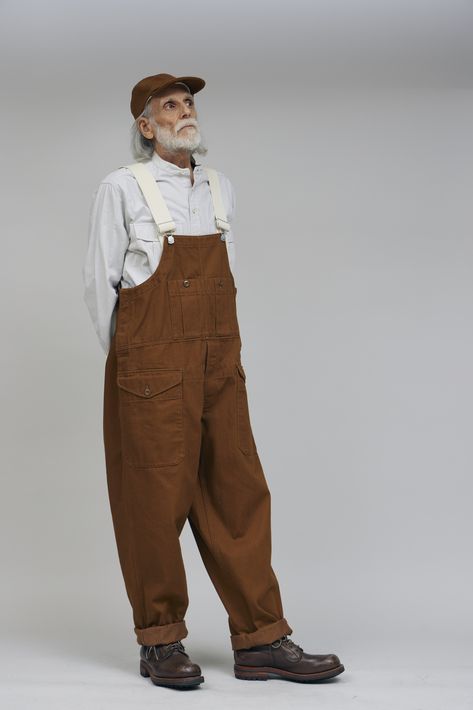 The Lybro Railway Dungaree is a refreshed classic Cabourn overall, inspired by the hardworking heritage railway workers. Designed with a relaxed fit and straight leg, these dungarees are crafted from a high quality cotton blend in a heavy 11.3oz woven drill, offering both durability and a timeless workwear aesthetic. Japanese Workwear Vintage, Workshop Outfit, Railway Workers, Wicked Fashion, Workwear Aesthetic, Japanese Workwear, Work Overalls, Heritage Railway, Fashion Reference