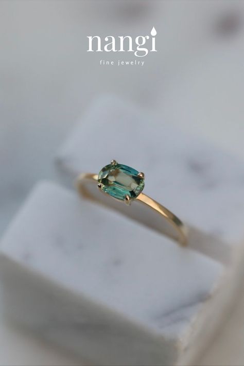 Gemstone Ring. An oval, green sapphire set in our east-west setting. Unconventional Wedding Rings, Gold Ring Band, Oval Sapphire Ring, Cute Engagement Rings, Green Rings, Gold Ring Designs, Green Sapphire, East West, Yellow Gold Ring