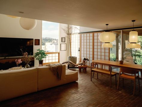 Japan’s ryokans and a wellness focus inspired the Silver Lake project. Check out the before and after images. Mid Century Modern Japanese House, Owiu Design, Modern Japanese Living Room, Japanese Mid Century Modern, Mcm Living Room, Modern Japanese House, Japanese Living Room, Japan Holiday, Los Angeles Interior Design