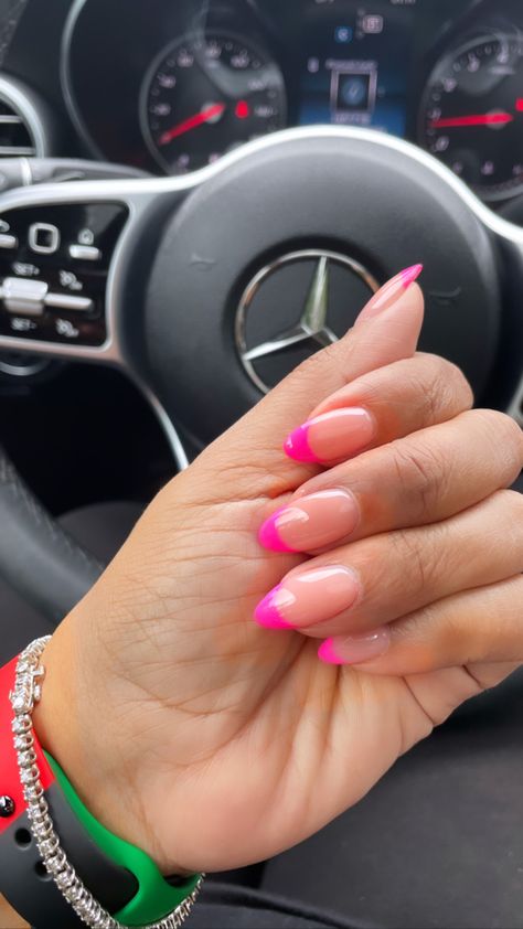 Pink Tip Oval Nails, Neon French Tip Nails Oval, Neon Pink Nail Tips, Neon Pink Almond Nails Design, Neon Pink Nails French Tip, Short Oval Nails Acrylic Pink, Pink French Oval Nails, Bright Pink French Nails, Neon Pink French Tip Nails Almond