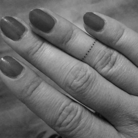 Dotted ring tattoo on the ring finger Mid Finger Ring Tattoo, Delicate Ring Finger Tattoo, Dot Ring Tattoo, Delicate Ring Tattoos For Women, White Ring Tattoo, Finger Ring Tattoo, Tatoo Ring, Wedding Ring Tattoos, Tattoo Rings