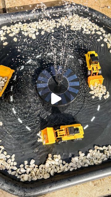 Engaging Elodie on Instagram: "Sometimes the best ideas are the simplest! 💡

Yesterday I used our @waytoplaytoys roads to create a simple circle track in our tuff tray. I then added our water fountain, diggers and stones from the garden. Very quick to setup and tidy away but provided hours of fun! 

There is a link to our fountain in my highlights! ☀️💙
#waytoplaytoys #waytoplay #1000hoursoutside #outdoorplay #inspiretheirearlyyears #funcraftyplay #playwithalbertandwilf #tufftrayideas #tufftray #tufftraytuesday #sensoryplay #reelsdaily #messyplay #waterplayideas" Water Tuff Tray Ideas, Sensory Garden, Tuff Tray, Water Play, Messy Play, Toddler Fun, Outdoor Play, Sensory Activities, Sensory Play