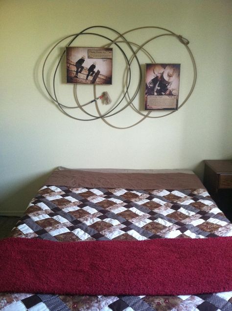 Fill headboard space with lasso and cowboy pictures in a western themed room. Western Headboard, Western Themed Room, Cowboy Bedroom, Headboard Alternative, Cowboy Room, Western Bedrooms, Western Wall Decor, Western Bedroom Decor, Bedroom Rustic