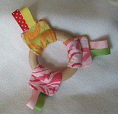 Quick Ribbon Ring Teether Toy Tutorial | Patchyapple Heart Sewing, Homemade Baby Gifts, Diy Teethers, Baby Gifts To Make, Taggie Blanket, Wooden Teething Ring, Baby Toys Diy, Fusible Fleece, Ribbon Ring