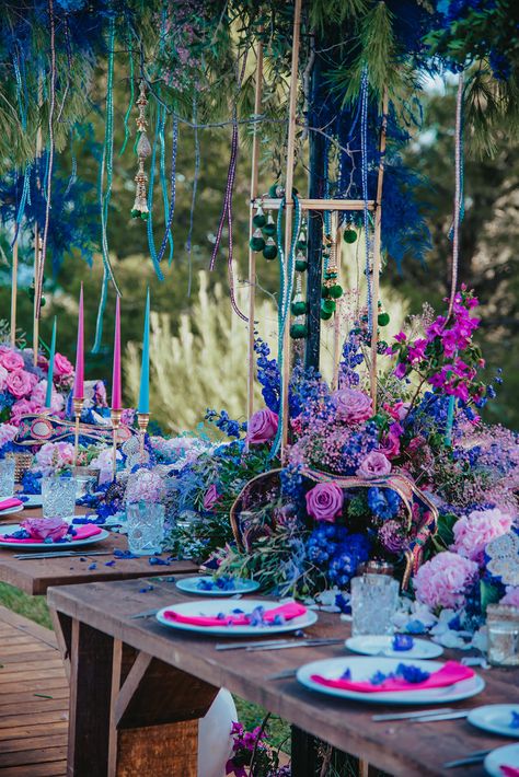 Amazing Pink, Purple and Blue Decor and Flowers for Wedding in Ibiza Blue And Purple Indian Wedding, Purple And Blue Event Decor, Indian Wedding Blue Decor, Pink Purple Blue Floral Arrangements, Pink Blue Flower Arrangement, Pink Purple Blue Flower Arrangement, Electric Wedding Theme, Pink Blue And Purple Wedding Theme, Pink Purple Blue Wedding Color Palettes