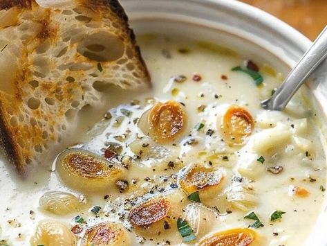 Rustic French Comfort: Savor the Rich Flavors of Country Garlic Soup! - NewsBreak Austrian Garlic Soup, Country Garlic Soup, French Garlic Soup Recipe, Country Fresh Garlic Soup, Country French Garlic Soup Recipe, French Garlic Soup, Country French Garlic Soup, French Soup Recipes, French Onion Meatballs Recipe