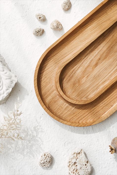 The picture shows half of the wooden double oval tray which features one oval tray inside of each other. The tray is made out of natural and steady oak which will serve for a very long time. The background contains small white flowers and white rocks. Cosy Home Decor, Oval Tray, Future Home, Decorative Trays, Home Inspiration, Oak Wood, Handmade Wooden, Rustic Charm, Tray Decor