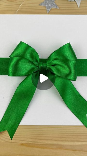 Olga Mogylova on Instagram: "Make a simple and effective bow on gift wrapping with your own hands, for this you will need a ribbon length of 70 cm and all, your beautiful bow in your hands 🎀🙌 Good luck and if you liked the video, you can thank me 🎁😊 #simplebows #ribbonbows #perfectbow #diybows #cutebow #xmasgiftwrapping #diychristmasdecorations #ecochristmas #ecohome #ecofriendlyhome #diygiftideas #giftpackaging #giftwrappingideas #howtotieabow" Diy Bows From Ribbon, Bow With Ribbon Diy Gift Wrapping, Package Bows Diy Simple, Simple Bows For Presents, Beautiful Bows How To Make, Ways To Tie Ribbon On Presents, Ribbon Bow For Gifts, Gift Wrap Ribbon Bow, Diy Present Bows Ribbon