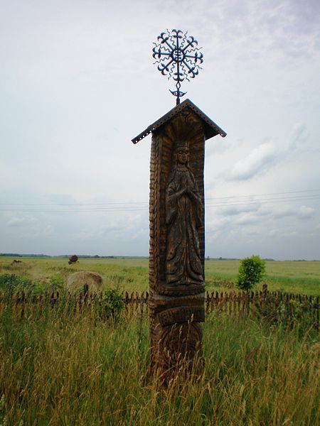 Prechristian Baltic Sun and the Moon cross at the top of wooden monument. Christian and pagan traditions are very interwined in Lithuanian culture Lithuanian Culture, Grass Weaving, Pagan Traditions, Slavic Mythology, Baltic Countries, Sun And The Moon, Zelda Botw, Mother Goddess, Oracle Deck