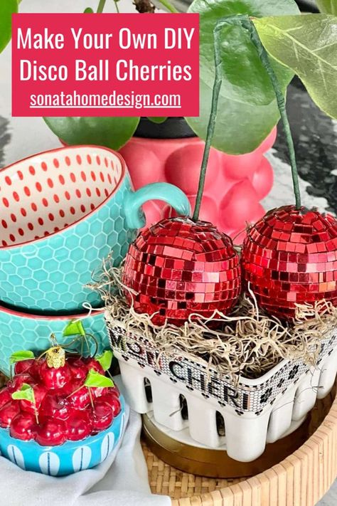 Get your groove on with our fabulous DIY disco ball cherries! 🍒 Create some unique home decor with these whimsical disco ball-inspired cherries that you can make. Perfect for any room, these craft projects are a fun and unique way to express your personality. Don't miss out on the fun – get step-by-step instructions on how to make DIY Disco Ball Cherries at Sonata Home Design! 💫 DIY home decor, disco theme, kitchen decor Diy Door Wreath, Disco Ball Cherries, Diy Disco Ball, Mirrored Tile, Valentine Wreath Diy, Outdoor Christmas Planters, Disco Decorations, Thrifted Decor, Birch Logs