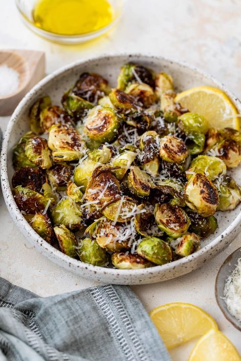 Here’s my go-to method for perfectly roasted Brussels sprouts with a charred, caramelized outside and tender inside. This easy oven-roasting method is a delicious base recipe for experimenting with additional flavors. #vegetables #sidedish #brusselssprouts #vevetablesidedish #vegetarian #lowcarb #healthyrecipes #weightwatchers Skinnytaste Brussel Sprouts, Brussel Sprouts In Oven, Oven Roasted Brussel Sprouts, Brussel Sprouts Recipes Easy, Roasted Brussel Sprouts Oven, Baked Brussel Sprouts, Brussel Sprout Recipes Roasted, Roasted Sprouts, Autumn Side Dishes