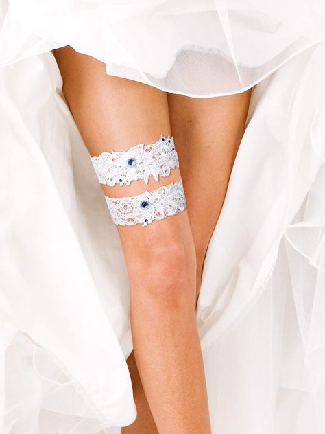 PRICES MAY VARY. Lace Hand Wash Only Wedding garter: this garter is designed as beautiful flowers pattern with shiny blue rhinestones, delicate and charming, lace add you a sense of elegance and femininity, a nice wedding accessory for your big day Quality material: these garters are made of quality lace, lightweight, elastic, not easy to rust and no odd smell, mild to your skin, soft and comfortable wearing experience, can serve you for long time Suitable occasions: enjoy your time with this be White Lace Garter, Bride Garter, Below The Knee Dress, Bridal Garter Lace, White Garters, Below The Knee Dresses, Bridal Garters Set, Bridal Garters, Weddings By Color