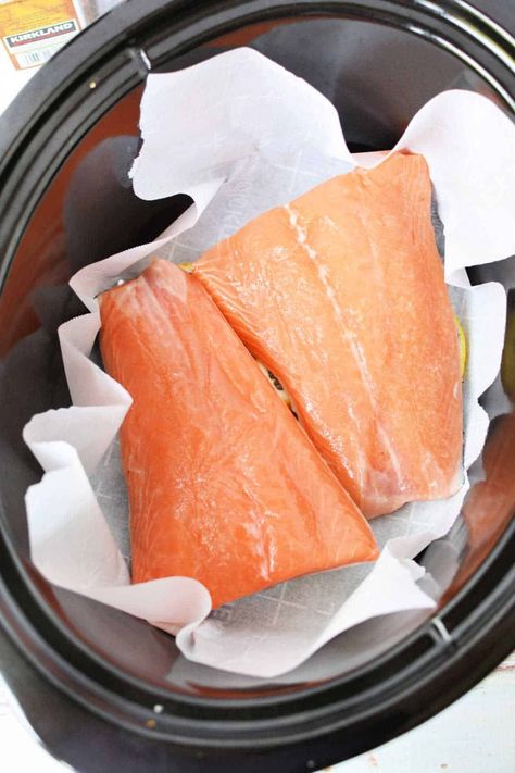 Crockpot salmon is a great way to set it and forget it so your fish comes out moist, flaky and perfect every time. Easy slow cooker meal. Crockpot Salmon Recipes Slow Cooker, Fish In Crockpot, Crock Pot Salmon, Crockpot Fish Recipes, Crockpot Fish, Slow Cooker Fish Recipes, Easy Slow Cooker Meal, Crockpot Salmon, Crockpot Chicken And Potatoes