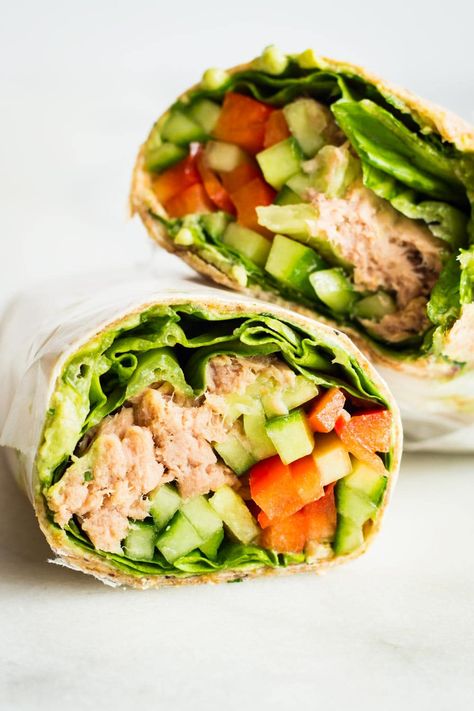 A tuna wrap is a convenient, grab-n-go healthy lunch, created especially with busy people in mind. With tuna, crunchy veggies, and a delicious avocado tahini dip for sauce, this healthy tuna wrap is ready in 10 minutes! Tuna Wraps Recipes, Fish Salads, Party Wraps, Tuna Wraps, Tuna Wrap, Wraps Recipes Healthy, Wraps Recipes, Healthy Tuna, Tuna Avocado