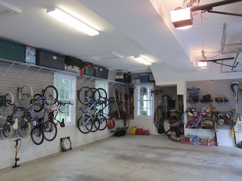 Garage Organization for a Family of 10!  (we have a family of 6 so this might come in handy) 3 Car Garage Organization, 2 Car Garage Organization, Garage Cabinets Organization, Diy Corner Shelves, Garage Wall Shelving, Corner Shelf Ideas, Garage Organization Systems, Overhead Garage Storage, Overhead Garage