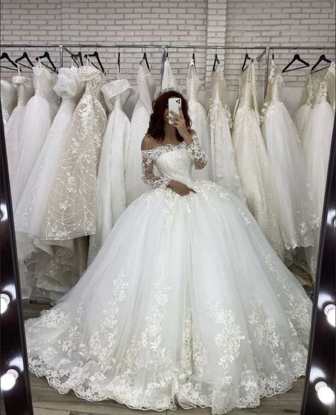 Wedding Dresses Trends of 2024 Cinderella Wedding Dress With Sleeves, Glittery Ballgown Wedding Dresses, Ballgown Dress With Sleeves, Big Long Sleeve Wedding Dress, Poofy Lace Wedding Dress, Wedding Dresses Corset Top Long Sleeve, Fluffy Wedding Dress Princesses, Puffy Wedding Dresses With Sleeves, Big Fluffy Wedding Dresses