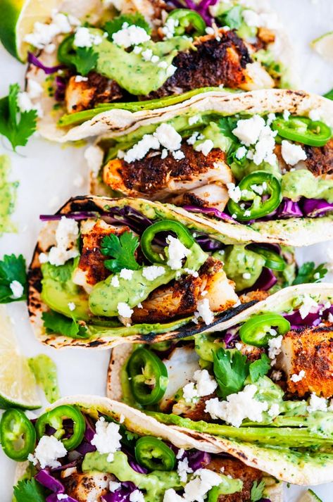 Blackened Cod Fish Tacos with Cilantro Avocado Sauce - The perfect seafood and Mexican fusion weeknight dinner done in less than 30 minutes! #blackened #cod #fish #tacos #cilantro #avocado #sauce #dressing #coleslaw #healthy #dinner #recipe #weeknight #Mexican #seafood Cod Tacos, Blackened Cod, Cod Fish Tacos, Mexican Fusion, Fish Tacos Recipe, Avocado Sauce, Cod Recipes, Fish Recipes Healthy, Summer Recipes Dinner