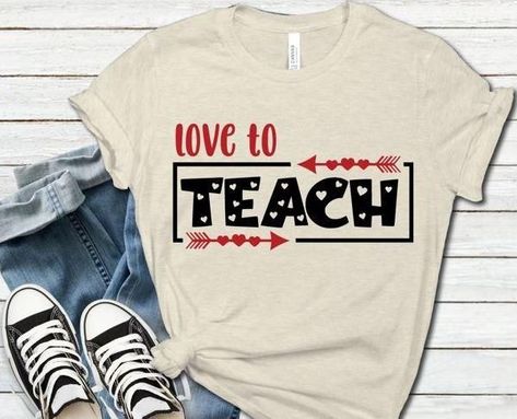 Elevate your Valentine's Day style with this Teacher Valentine Shirt. Show your love for education in this trendy and comfortable tee. Perfect for teachers who want to make a statement with their fashion. Get yours now and embrace your passion for teaching. #TeachersRock #ValentinesDayFashion #EducateWithLove Teacher Valentines Shirt, Valentine Teacher Shirts, Valentines Teacher Shirt, Valentines Day Teacher Shirts, Cricut Preschool, Teacher Valentine Shirts, Valentines Tees, Diy Valentine's Shirts, T Shirt Text Design