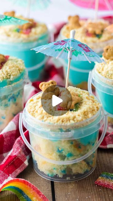 Britni V | Play Party Plan on Instagram: "These were gone so fast!! 🏖️

These beach bucket desserts are a super easy summer treat that kids will love but they’re tasty enough for adults! Plus, they’re adorable and perfect for beach and pool parties!

Comment SAND PUDDING and I’ll DM you a link to the recipe! Or check out https://www.playpartyplan.com/sand-pudding-buckets/ right now! 

Want a link to the buckets I used? Comment BUCKETS and I’ll send you a link to the ones I used!

#beachparty #poolpartytime #beachfood #partyfood #funfood #kidfood #cutefood #summerdessert" Pool Party Themed Snacks, Pool Party Dessert Ideas, Beach Dirt Cups, Sand Bucket Dessert Pudding Recipe, Sand Bucket Dessert, Sand Pudding Dessert Dirt Cups, Pool Party Dessert, Pool Party Desserts, Sand Bucket Cake