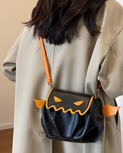 Ghouls’ Night Out 👻👜: Carry It All in Style! #halloween #crossbodybag #spooky #pumpkin Halloween Purse, Pumpkin Cartoon, Small Wing, Cloud Bag, 1 Image, Pumpkin Design, Halloween Pumpkin, Square Bag, Bat Wings