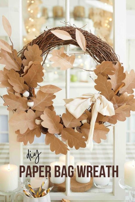 Make a fall wreath or garland for your autumn home decorations. Here's an easy Paper Wreath DIY that uses recycled paper bag leaves. You'll need a few things for this project, like a grocery store paper bag, scissors, glue, a grapevine wreath, and a white chalk pen, to name a few. Fall Paper Wreaths Diy, Paper Bag Leaves Garland, Autumn Paper Flowers, Fall Wreath Ideas Diy Autumn, Thanksgiving Paper Decorations, Paper Bag Christmas Decorations, Paper Bag Decoration Ideas, Paper Bag Crafts Diy, Autumn Paper Decorations