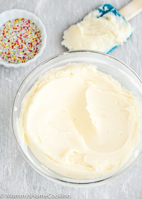 This Easy Vanilla Buttercream Frosting recipe makes the most creamy, smooth, and delicious frosting ever! With the perfect combination of butter and sugar, this amazing vanilla buttercream holds its shape beautifully so it’s perfect for piping even the craziest designs. @mommyhomecookin #recipe #eggfree #eggless #egglessbaking #eggallergy #buttercream #vanilla #frosting #easy Easy Vanilla Buttercream Frosting, Eggless Vanilla Cupcakes, Homemade Vanilla Frosting, Vanilla Buttercream Frosting Recipe, Eggless Vanilla Cake Recipe, Homemade Frosting Recipes, Easy Vanilla Cupcakes, Egg Free Baking, Easy Vanilla Cake Recipe