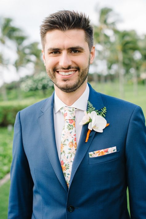 Groomsmen Attire Tropical, Navy Suit With Floral Tie, Groomsmen Hawaii Wedding, Wildflower Wedding Groom Suit, Blue Suit Tropical Wedding, Tropical Groom Boutonniere, Floral Tie Groom, Floral Tie Wedding, Groomsman Attire