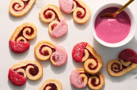 Mini Raspberry Elephant Ears | King Arthur Baking: Crisp, light, and flaky, with a swirl of raspberry inside, these miniature slice-and-bake cookies deliver a lot of visual appeal for very little effort. For even more raspberry flavor and a standout visual effect, dip them in the accompanying raspberry glaze. Confectioners Sugar Glaze, Palmiers Recipe, Raspberry Glaze, King Arthur Baking, Strawberry Powder, Freeze Dried Raspberries, Dried Raspberries, Freeze Dried Fruit, King Arthur Flour