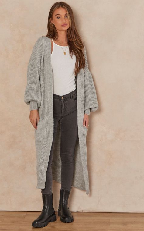 This slouchy cardigan will provide a relaxed vibe to any wardrobe. With a light grey long, chunky knit, long sleeves, and a baggy fit, pair it with light wash denim for a look that can be dressed up or down. Lounge, Work from home, Winter, Date night in, Staycation, knitted/wool, longline, bloat-friendly, Basic, Long Sleeve, Breastfeeding, A-Line Light Grey Cardigan Outfit, Hooded Cardigan Outfit, Loungewear Cardigan, Cozy Fall Outfits Aesthetic, Duster Cardigan Outfit, Outfits With Grey Cardigan, College Outfits Fall, Long Knitted Cardigan, Tudor Period