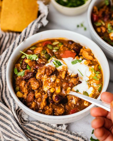 Instapot Pumpkin Turkey Chili | This delicious and warming Pumpkin Chili is the best chili recipe I have ever made! It is so flavorful, and so easy to make. And the best thing is, you can make it in the instant pot and have dinner on the table in less than 30 minutes! This Pumpkin Chili Recipe is packed with ingredients you likely have on hand and will make your hungry family happy and satisfied. #cozymeals #instapotmeal #pumpkinchili Turkey Chili Instant Pot, Pumpkin Turkey Chili, Chili Instant Pot, The Best Chili Recipe, Turkey Pumpkin Chili, Pumpkin Chili Recipe, Slow Cooker Turkey Chili, The Best Chili, Pumpkin Turkey