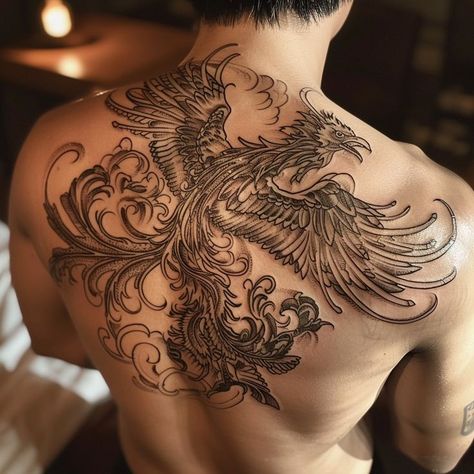 Detailed phoenix tattoo design on man's back symbolizing rebirth and immortality Phoenix Tattoo Men, Phoenix Rebirth, Phoenix Back Tattoo, Rebirth Tattoo, Mythical Bird, Phoenix Tattoo Design, Mythical Birds, Shoulder Arm Tattoos, Back Tattoos For Guys