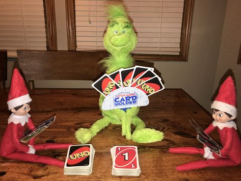 Elf On The Shelf Board Games, Elf Vs Grinch Ideas, Grinch Vs Elf On The Shelf, Grinch On A Bench Ideas, Elf Stuff, Kindness Elves, Cards On The Table, Xmas 2022, Uno Cards