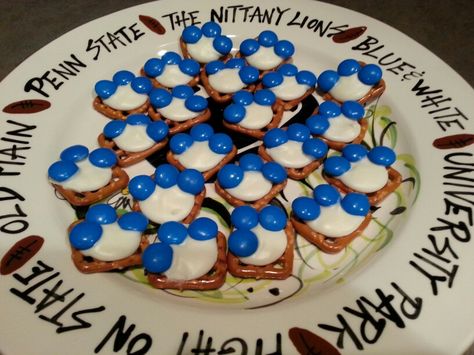 Penn State paw treats for the PSU games!!   (Snap pretzels, Wilbur white chocolate wafers & blue M & Ms) Penn State Tailgate Ideas, Penn State Birthday Party, Penn State Tailgate Food, Penn State Party Ideas, Penn State Graduation Party Ideas, Penn State Graduation Party, Penn State Party, Psu Tailgate, Penn State Tailgate