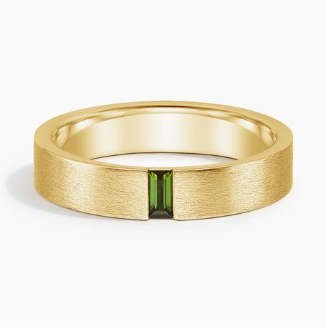 Men's 18K Yellow Gold Apollo Green Tourmaline 4.5mm Wedding Ring. This modern wedding band features a vertical baguette green tourmaline set in a matte brushed finish for a defining look. The softened inside edge provides increased comfort for daily wear. Mens Wedding Ring Unique, Man Wedding Ring With Diamonds, Engagement Rings Guys, Mens Wedding Ring With Emerald, Men’s Wedding Bands With Stones, Marriage Ring Men, Mens Wedding Bands Simple, Men’s Wedding Band With Emerald, Gold Band Wedding Ring Men