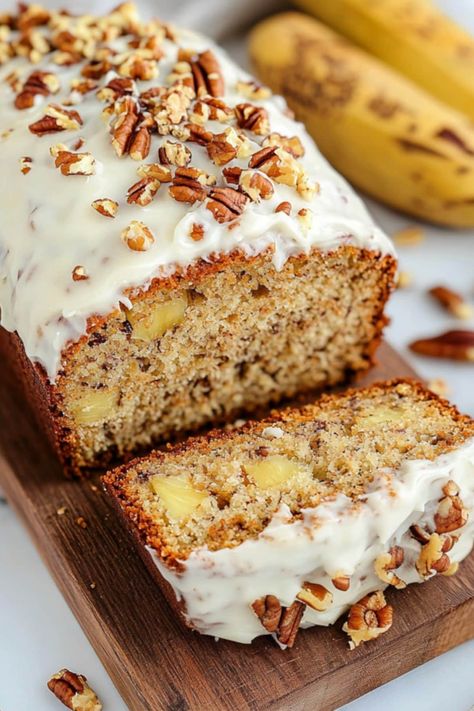 Hummingbird bread is an incredibly moist and flavorful quick bread loaded with sweet bananas, crushed pineapple, chewy coconut, and crunchy pecans. Hummingbird Bread Recipe, Hummingbird Bread, Pineapple Coconut Bread, Bread With Cream Cheese, Banana Pecan Bread, Coconut Banana Bread, Pineapple Bread, Southern Cake, Coconut Bread