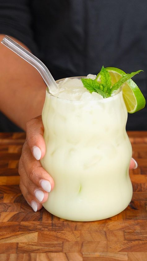 Coconut Brazilian Lemonade Recipe by Tasty Brazilian Lemonade Recipe, Coconut Lemonade, Tasty Logo, Coconut Condensed Milk, Lemon Margarita, Best Mocktails, Chili Con Carne Recipe, Brazilian Lemonade, Ginger Fizz