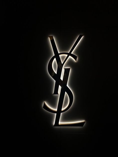 Gold Black Wallpaper Aesthetic, Eve Saint Laurent, Ysl Logo Aesthetic, Black Vogue Aesthetic, Dark Expensive Aesthetic, Ysl Background, Saint Laurent Aesthetic Wallpaper, Chanel Logo Aesthetic, Black Elegant Aesthetic