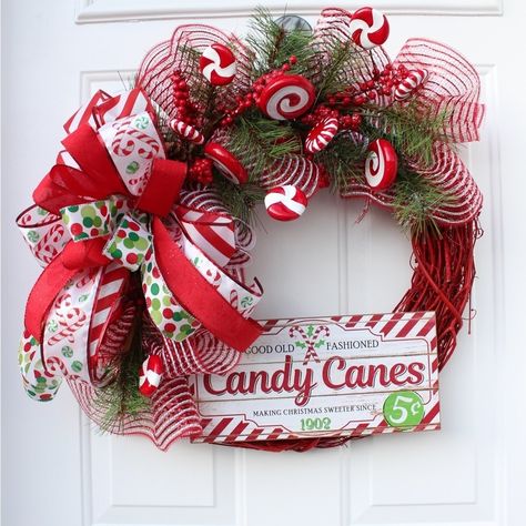 Event Craft Studio Candy Cane Grapevine Wreath Red Original Design One-Of-A-Kind Handmade New A Whimsical Candy Cane Christmas Wreath For Your Front Door! This Whimsical Wreath Is Made Of Festive Holiday Ribbons And Mesh On A Grapevine Base. Fun Peppermint Picks Pop Out Of The Decorative Mesh And Pine Bed. A Candy Cane Sign And Gorgeous Bow Add The Final Details To This Very Modern, Yet Whimsical Wreath. A Definite Contemporary Stunning Piece Of Holiday Decor. The Video Was Taken On A Gloomy Fal Christmas Wresths, Elf Decor, Rs Activities, Grapevine Christmas, Christmas Wreath Decor, Whimsical Christmas Decor, Christmas Wreath Craft, Christmas Door Decoration, Christmas Wreath For Front Door