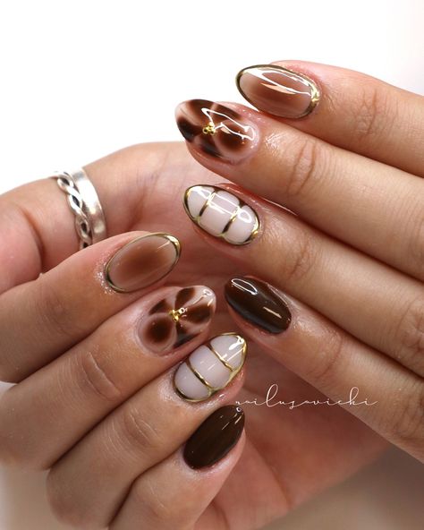 If brown isn’t a fall staple then idk what is 🍂🤎 . . #nails #nailusa #nailart #naildesign #nailsofinstagram #naildesigns #nailsoftheday #naildesignsideas #gel #gelnails #raleigh #durham #nailinspo #raleighnailtech #ncnails #raleighnails #raleighnailtech #trend #trendynails #BIAB #springnails #BIABnails #summernails #naturalnails #raleighgelx #gelx #gelxnails #fallnails Nude And Brown Nail Designs, Brown Biab Nails, Dark Brown Nail Art, Fall Funky Nails, Short Brown Acrylic Nails, Teal And Brown Nails, Brown And Cream Nails, Brown And Black Nails, Nail Design Ideas Winter