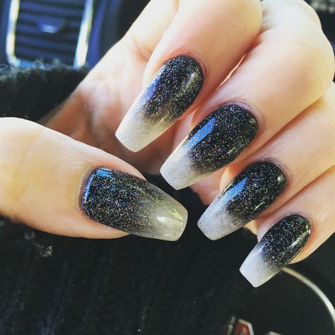 Nails are ombré with black and white powder and silver glitter gel polish. Silver And Black Ombre Nails, Black Ombré Nails, Black Ombre Nails, Classy Acrylic, Ombré Nails, Ombre Nails Glitter, Glitter Gel Polish, Short Coffin Nails, Goth Nails