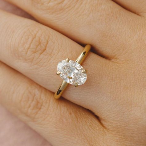 Our stunning Lara Oval Lab Grown Diamond Engagement Ring is part of our 'ready made' collection. Available for purchase now! Specifications below: Oval Lab Grown Diamond 14 ct Yellow Gold Set with a 2.02 ct E VVS2 Oval Diamond Measurement: 10.51 x 7.19 x 4.36mm IGI 659436051 Size: N Want something custom? If you love this style but wish to make it with another centre diamond, metal type or to suit your preferred budget, contact us about your ideal design vision. Custom crafted rings take approxi Classic Gold Rings, Black Zirconium Ring, Diamond Signet Ring, Mens Gold Rings, Black Diamond Ring, Lab Grown Diamonds Engagement, Diamond Anniversary Rings, Ladies Diamond Rings, Yellow Gold Setting