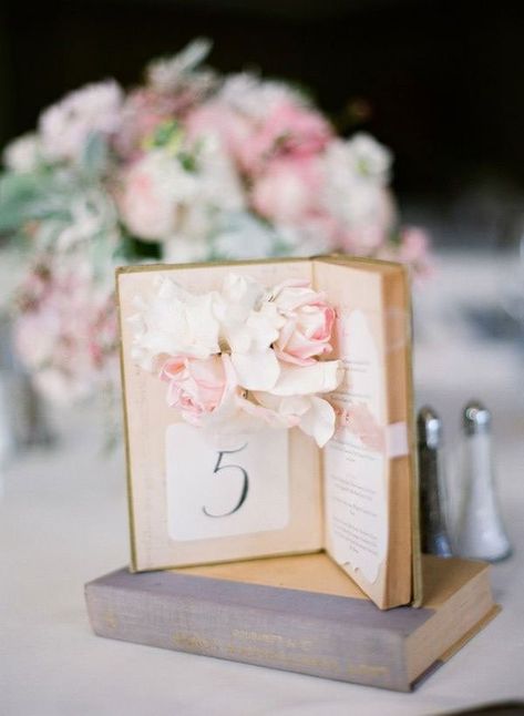 17 Creative Ways to Display Your Wedding Table Numbers | weddingsonline Book Table Numbers, Wedding Table Menus, Wedding Table Themes, Literary Wedding, Boda Diy, Love Story Wedding, Book Table, Creative Display, Creative Wedding