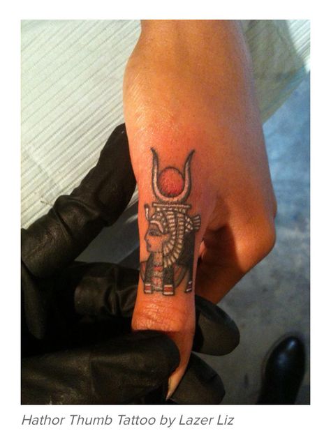 Hathor, Egyptian goddess of love. Once tattoos are more widely accepted in the workplace, I will definitely be getting something like this on my hand! Goddess Of Love Tattoo, Hathor Tattoo, Lotus Flower Tattoo Wrist, Egyptian Goddess Tattoo, Name Tattoo On Hand, Egyptian Tattoos, Small Lotus Tattoo, Underarm Tattoo, Thumb Tattoos