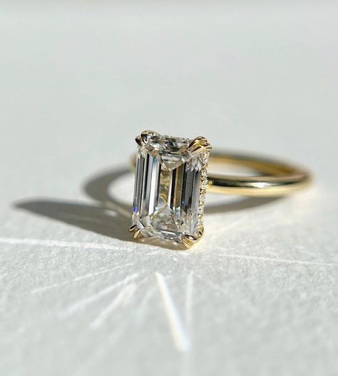 14k Solid Yellow Gold Engagement Ring 3.42 TC Elongated Emerald Cut Moissanite Wedding Ring Handmade Hidden Halo 4 Double Claws Trend Setter ❤ ITEM DETAILS:- ✦ Brand: The American Gold House (TAGH) ✦ Handmade, high-quality item! ✦ Material: Solid 10K/14K/18K Gold, 950 Platinum and 925 Sterling Silver ✦ Diamond Type: Moissanite Diamond ✦ Diamond Cut: 7x10 MM Elongated Emerald ✦ Diamond Weight: 3.21 CT ✦ Main Stone Color: Colorless ✦ Width of Band: 1.8 MM (Bottom) ✦ Diamond Clarity: VVS/VS ❤ ACCEN Emerald Gold Wedding Rings, Hidden Halo Engagement Ring Emerald, Wedding Ring Cuts Chart, Wedding Rings Engagement Radiant, Emerald Engagement Ring 3 Carat, Double Prong Emerald Cut Engagement Ring, Emerald Cut With Hidden Halo, Emerald Cut Engagement Ring Hidden Halo, Hidden Halo Emerald Engagement Ring